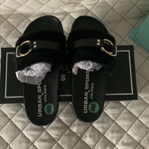 J Slides NWT black with faux fur and buckle.